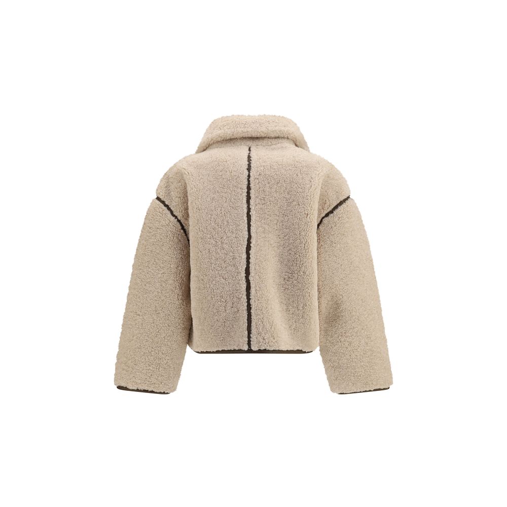 Indulge in the PINKO Beige Polyester Full-Length Jacket, a luxurious eco shearling masterpiece that redefines elegance and sophistication for the discerning wardrobe.