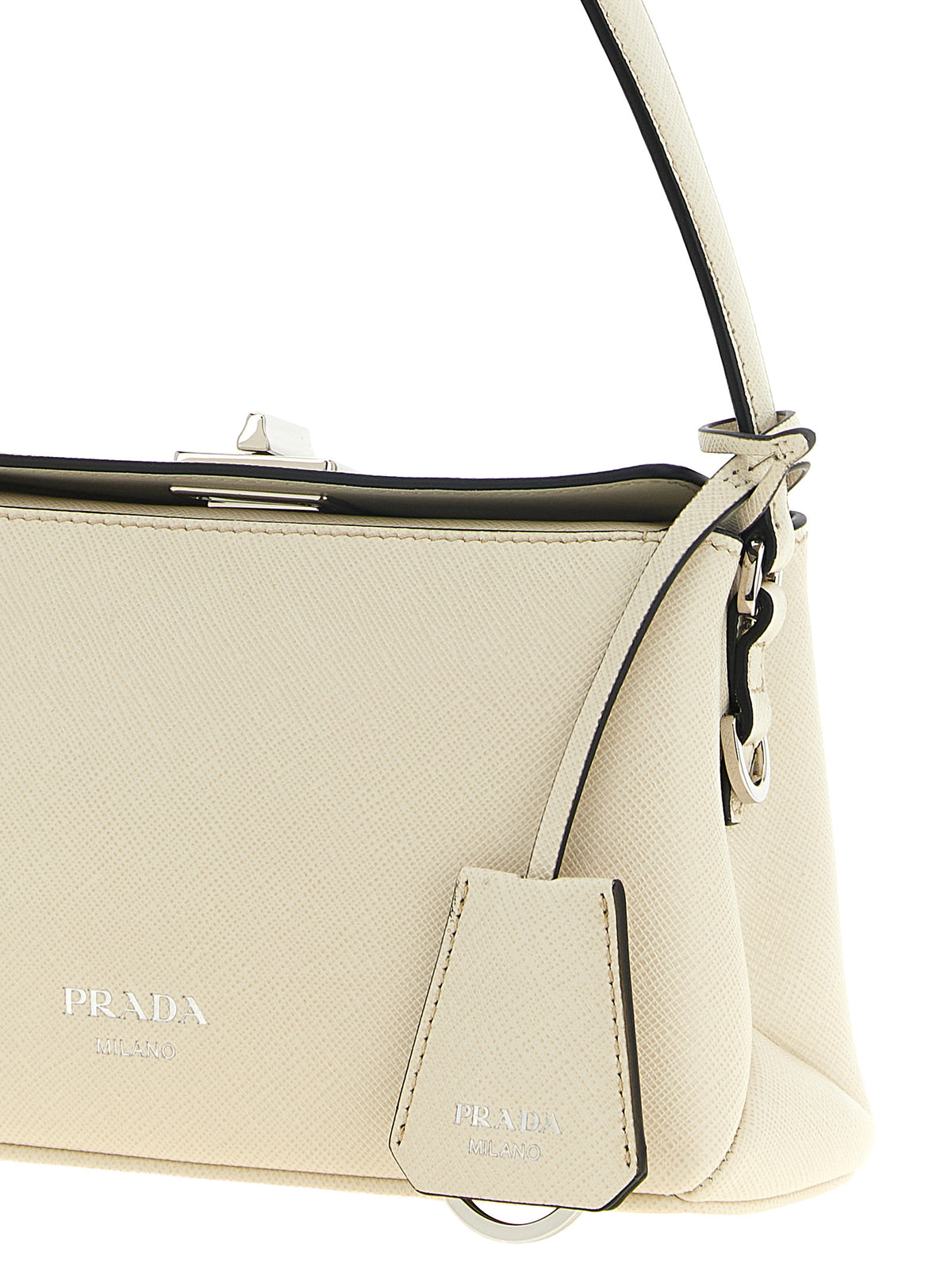 Indulge in the Prada White Calfskin Handbag, a masterpiece of Italian craftsmanship, where timeless elegance meets modern sophistication for the discerning individual.