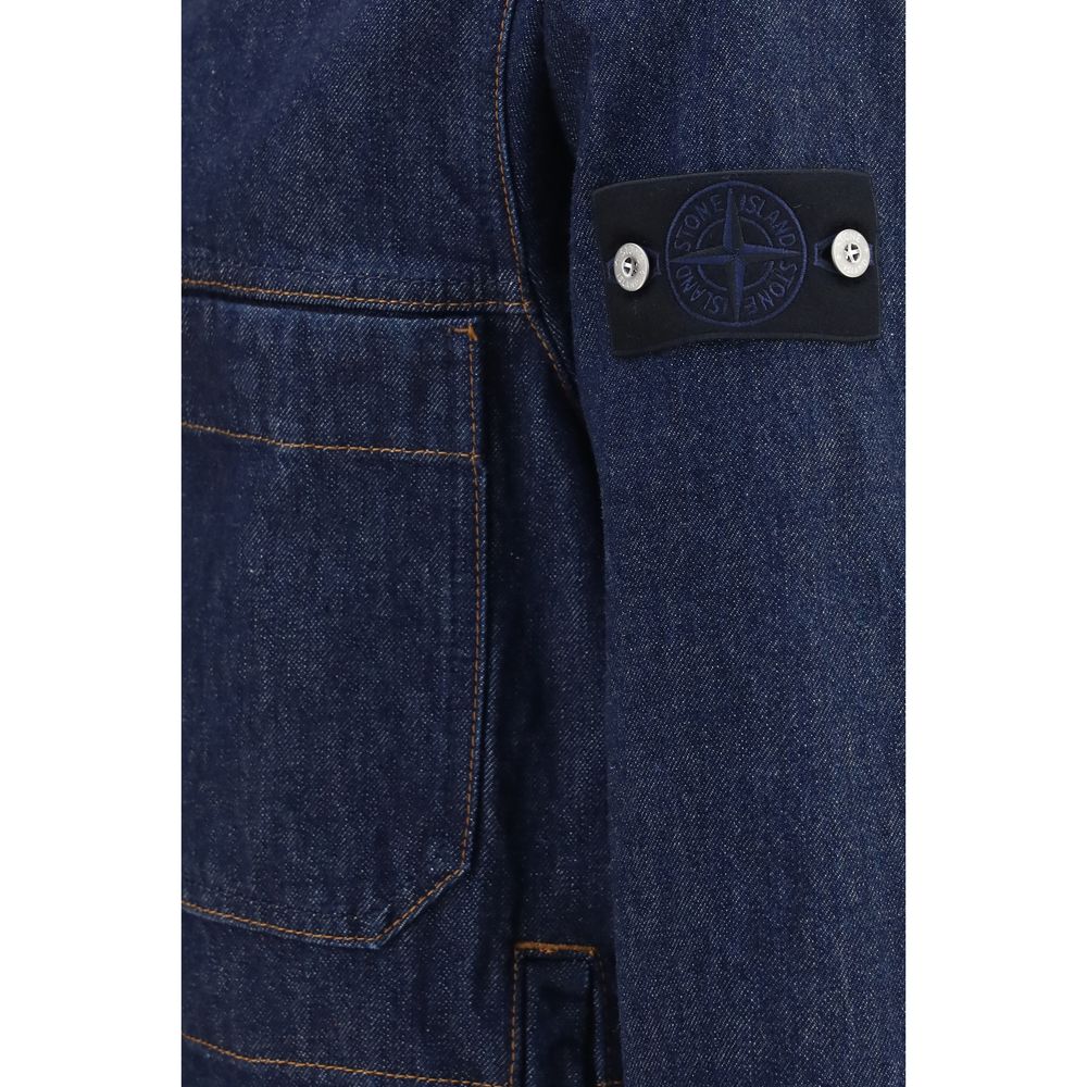 Experience the allure of the Stone Island Blue Cotton Denim Jacket, crafted from premium 13.5 oz denim, embodying timeless elegance and sophisticated versatility for the discerning individual.