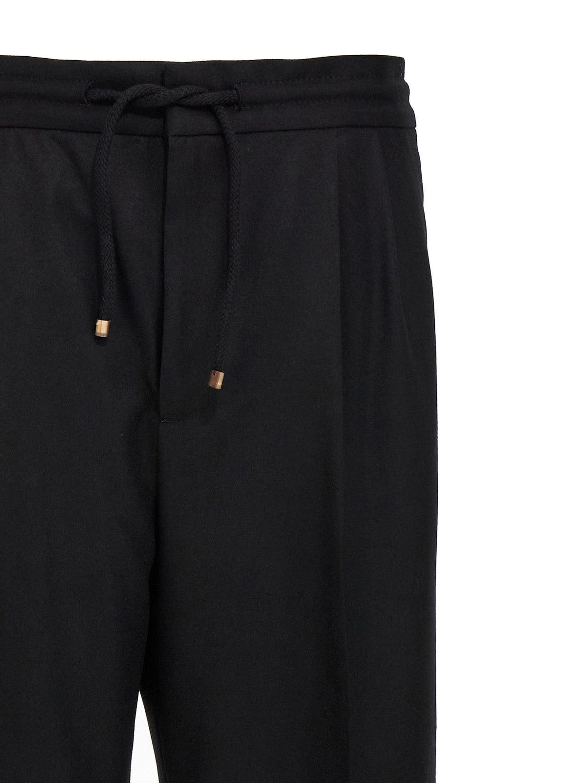 Elevate your wardrobe with Brunello Cucinelli's Black Wool Casual Pants, crafted from luxurious 100% wool for timeless sophistication and effortless style.