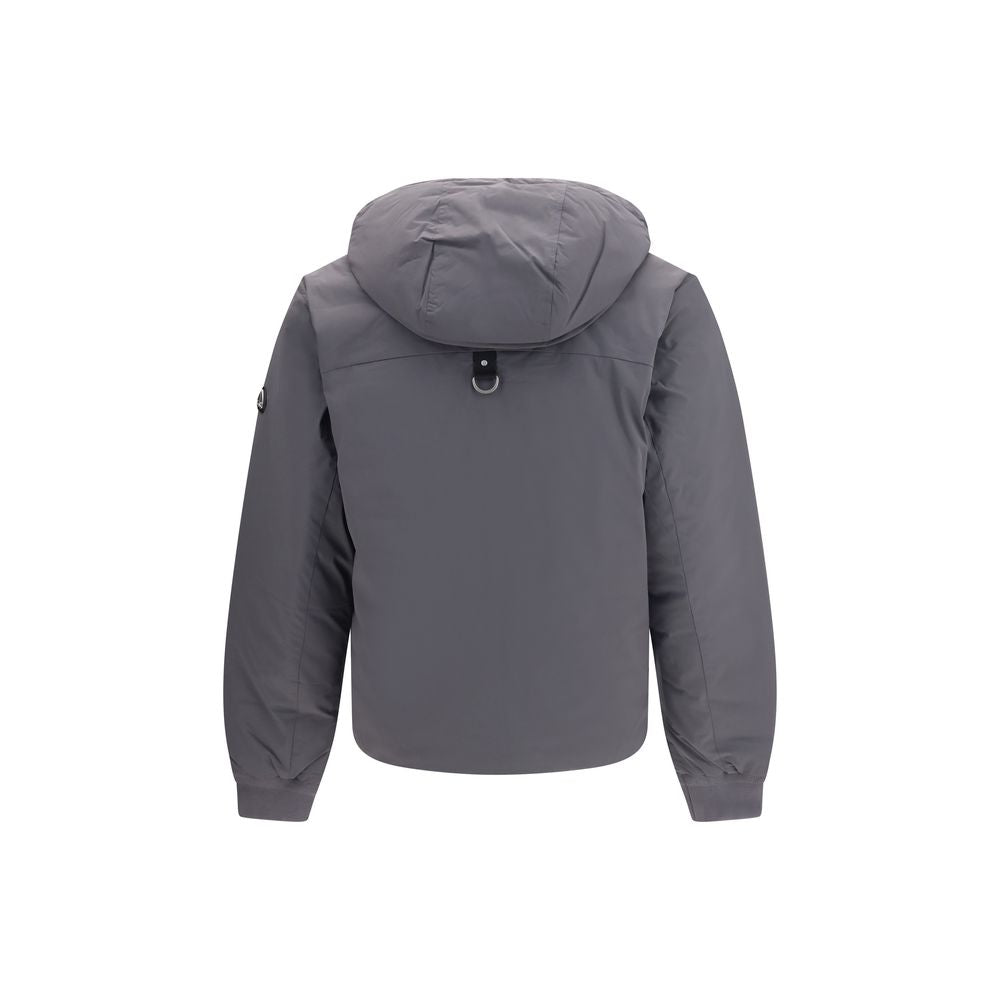 Indulge in the exquisite Moose Knuckles Gray Nylon Full-Length Jacket, a masterful blend of luxury and functionality, crafted for those who command elegance and warmth.