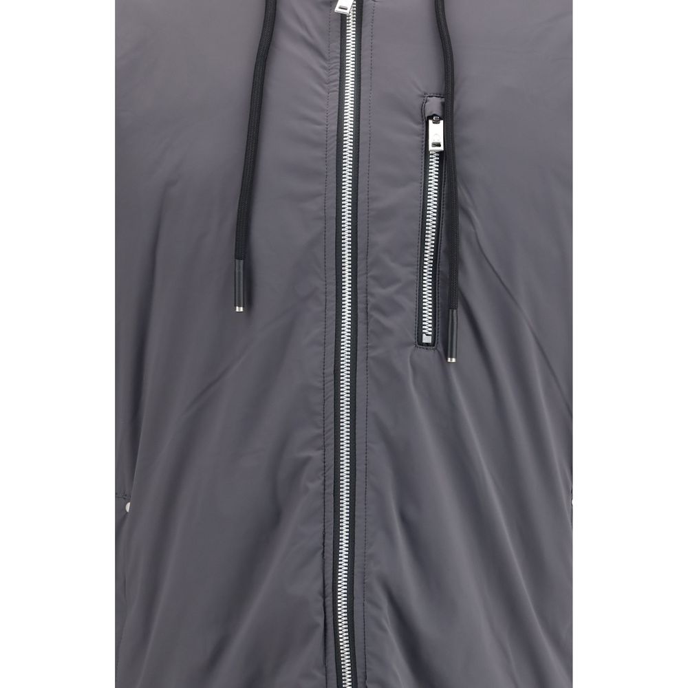 Discover the Moose Knuckles Gray Nylon Full-Length Jacket, a masterpiece of exquisite craftsmanship, blending luxury and functionality for the discerning individual.