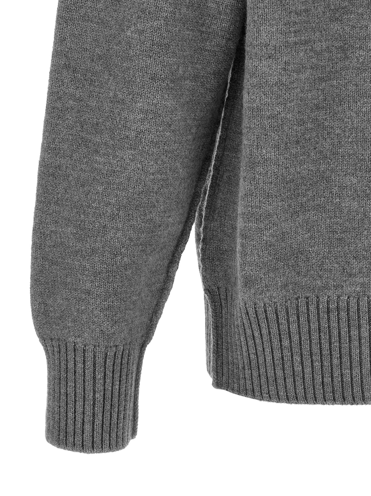 Elevate your style with the Ami Paris Gray Wool Cardigan, a luxurious blend of comfort and sophistication, crafted from 100% wool for timeless elegance.