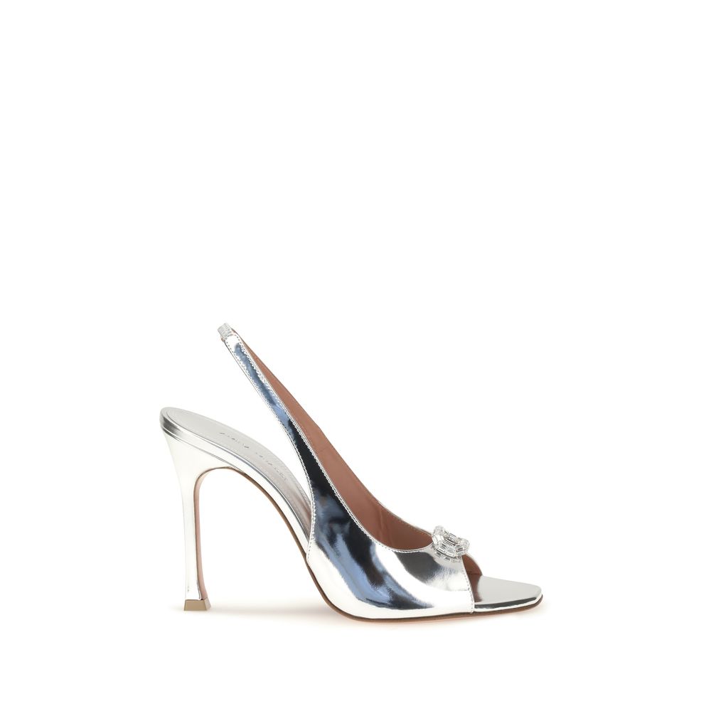 Elevate your style with Amina Muaddi Silver Calf Leather Bos Taurus Sandals, where exquisite craftsmanship meets luxurious comfort, perfect for any sophisticated occasion.