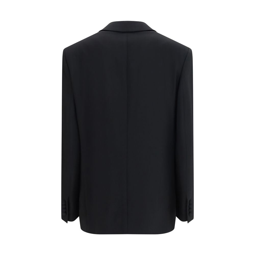 Discover the exquisite Jona Blazer by The Row, crafted from luxurious fleece wool for a refined silhouette that embodies timeless elegance and sophisticated allure.