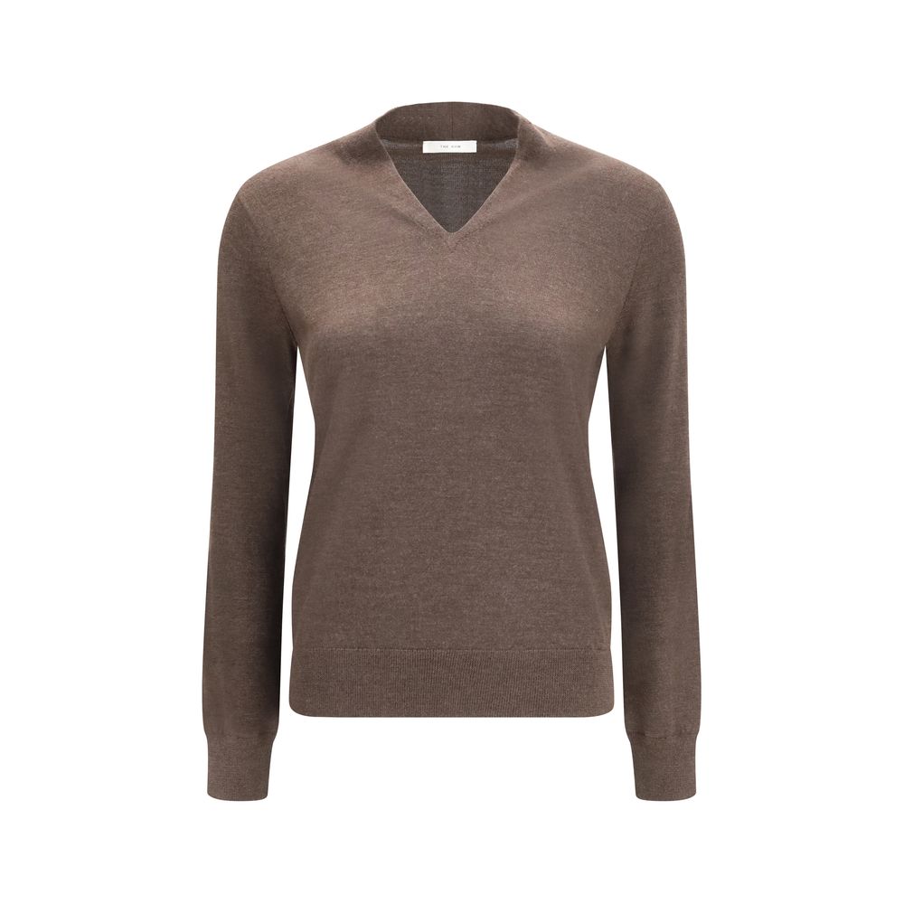Indulge in the refined elegance of The Row's Brown Cashmere Sweater, a luxurious blend of cashmere and silk, embodying minimalist sophistication for the discerning individual.