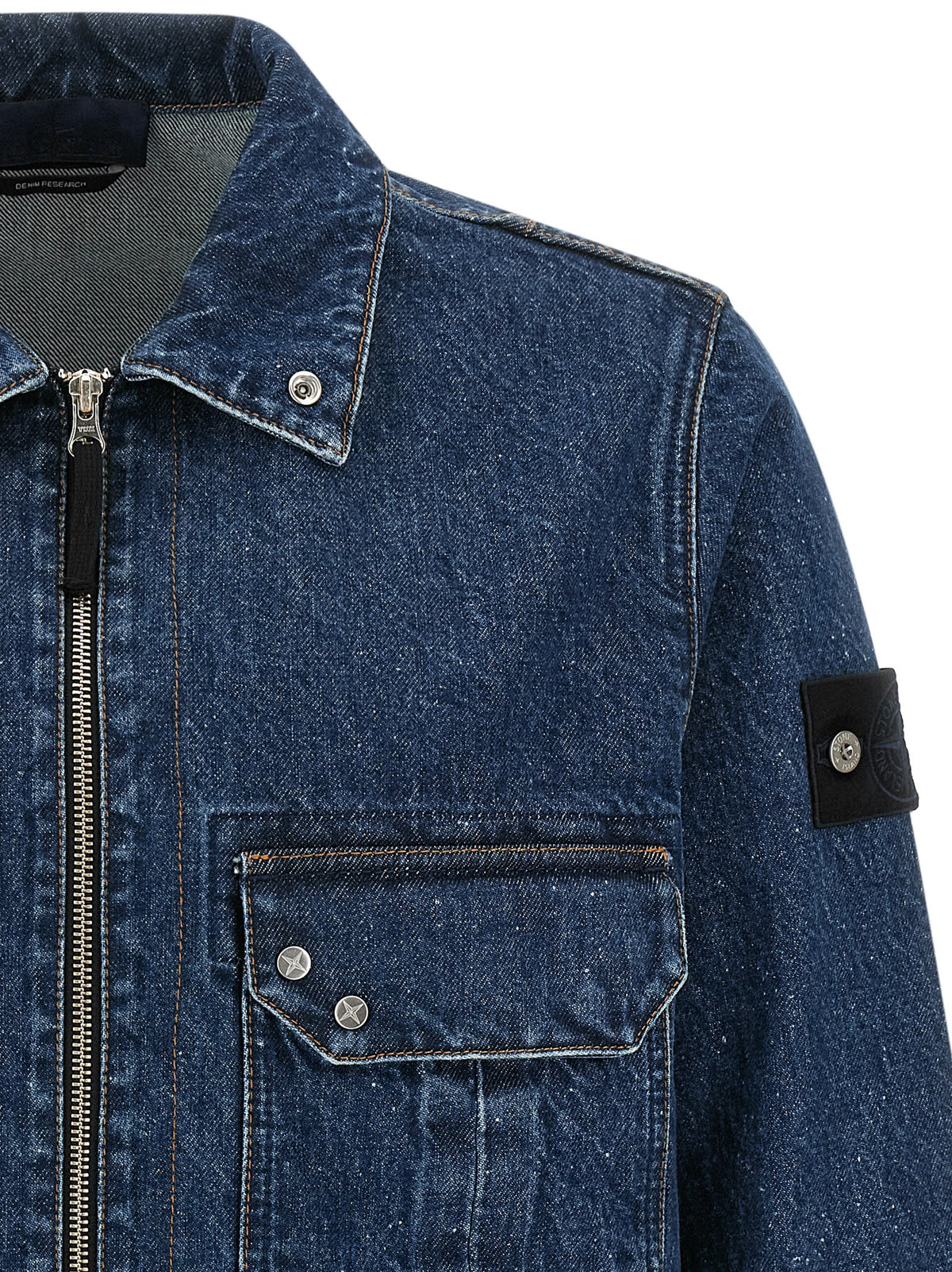Elevate your wardrobe with the Stone Island Blue Cotton Blouse, a masterful blend of utilitarian elegance and contemporary design, crafted for the discerning individual.