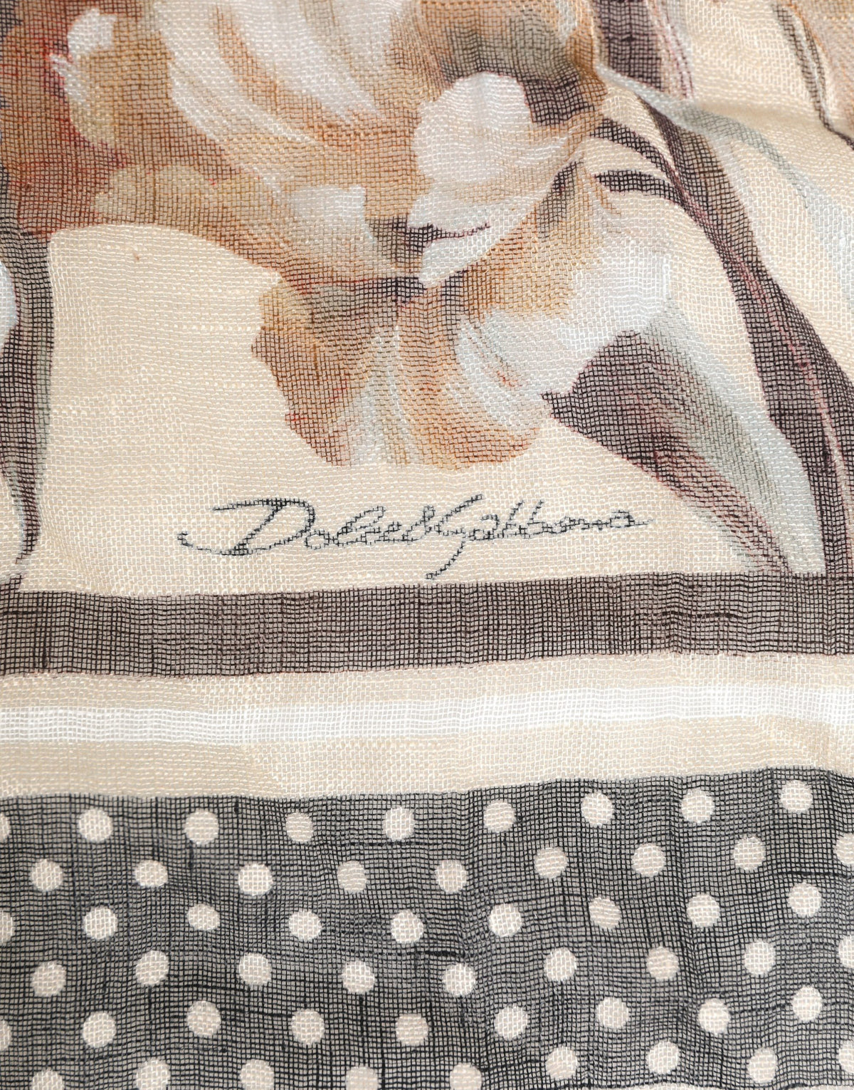 Elevate your style with the Dolce & Gabbana floral linen foulard scarf, a masterpiece of Italian craftsmanship in cream and beige, perfect for the discerning connoisseur.