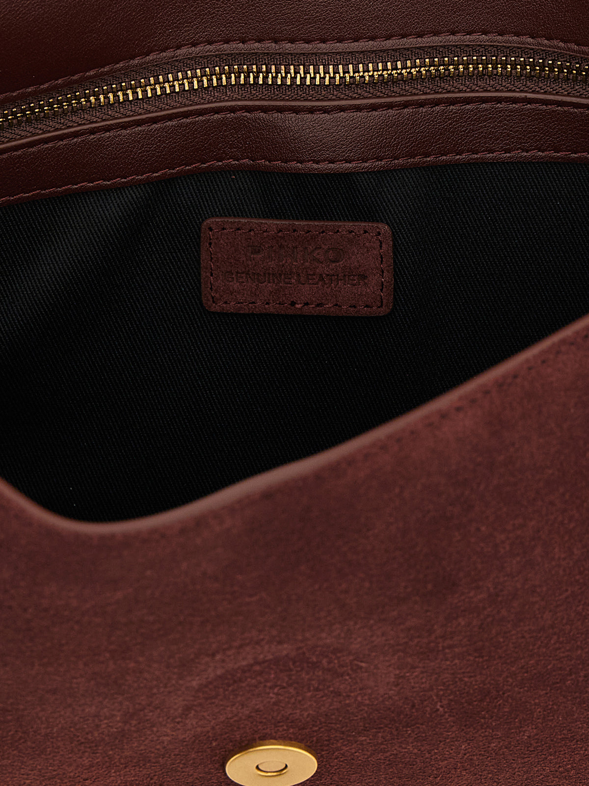 Indulge in the PINKO Bordeaux Calfskin Shoulder Bag, a masterpiece of exquisite craftsmanship and timeless elegance, perfect for the discerning individual who appreciates luxury.