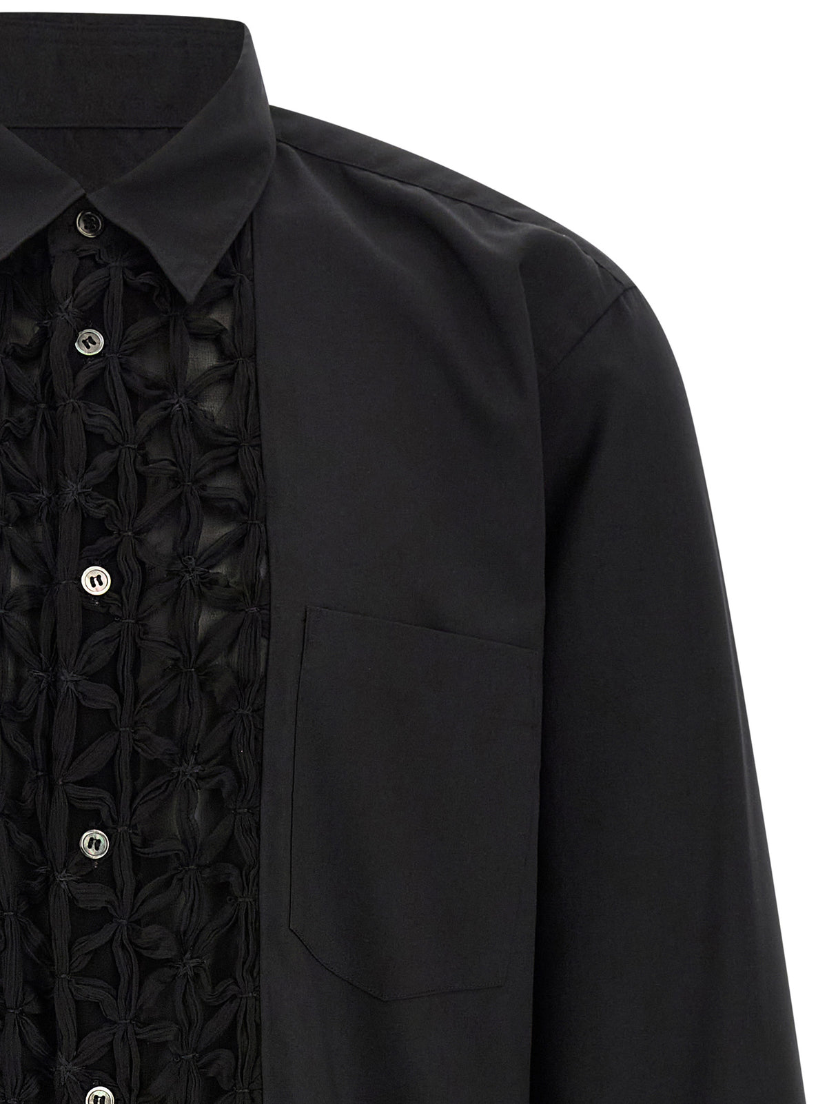 Elevate your wardrobe with the Comme Des Garçons Black Polyester Blouse, a masterpiece of avant-garde design and innovative craftsmanship that redefines luxury fashion.