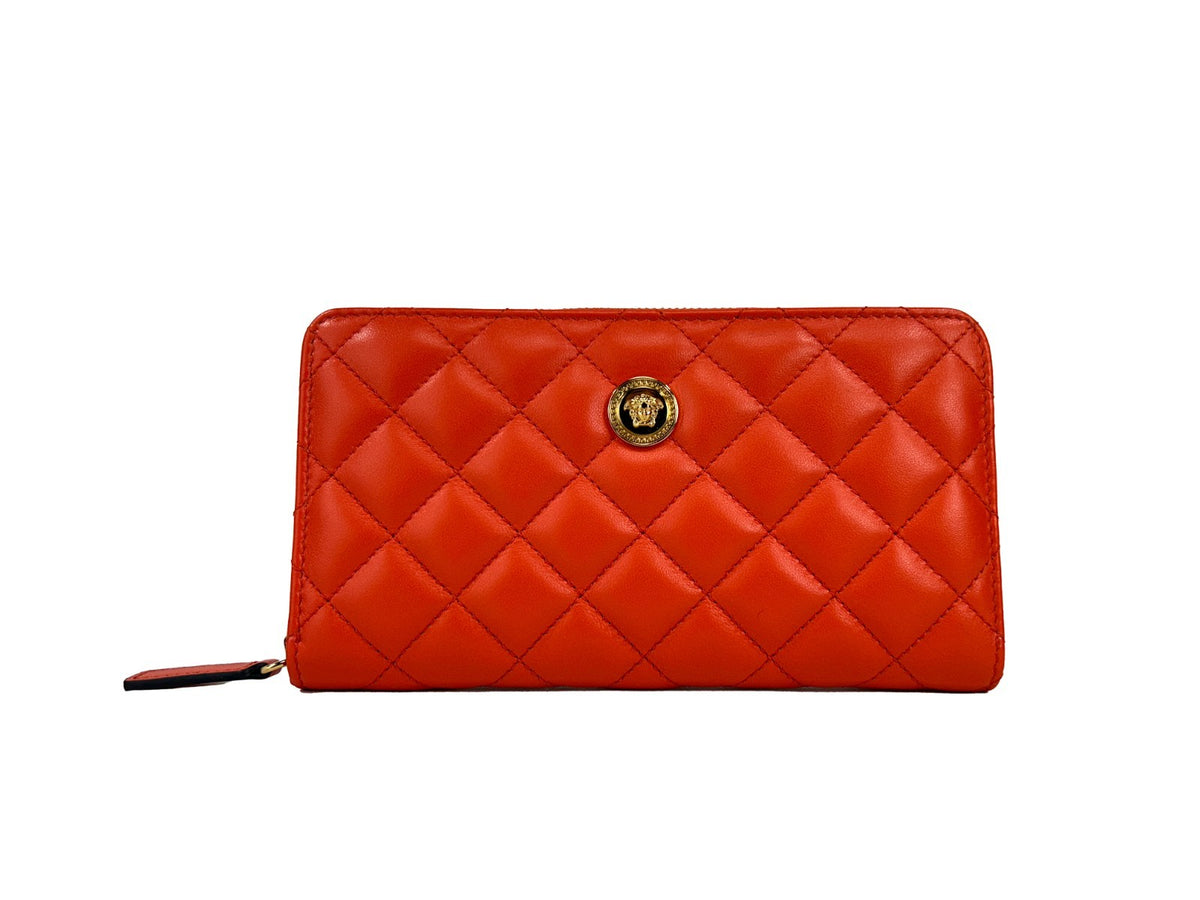 Elevate your style with the Versace Quilted Leather Continental Clutch Zip Wallet, a masterpiece of luxury and elegance, crafted for those who appreciate refined sophistication.