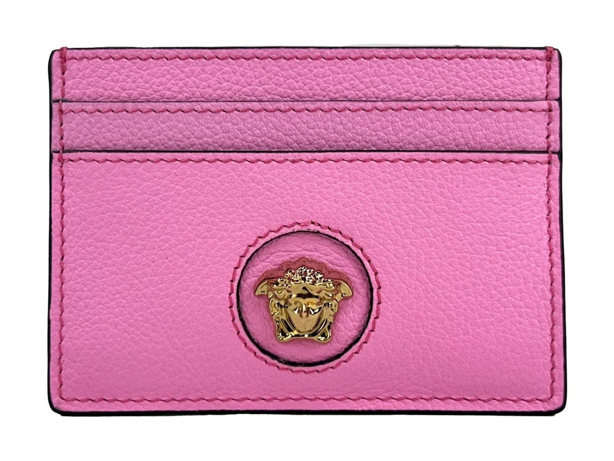Discover the Versace Mini Medusa Pink Grainy Leather Slim Card Case Wallet, where exquisite craftsmanship meets modern elegance, embodying luxury and sophistication.