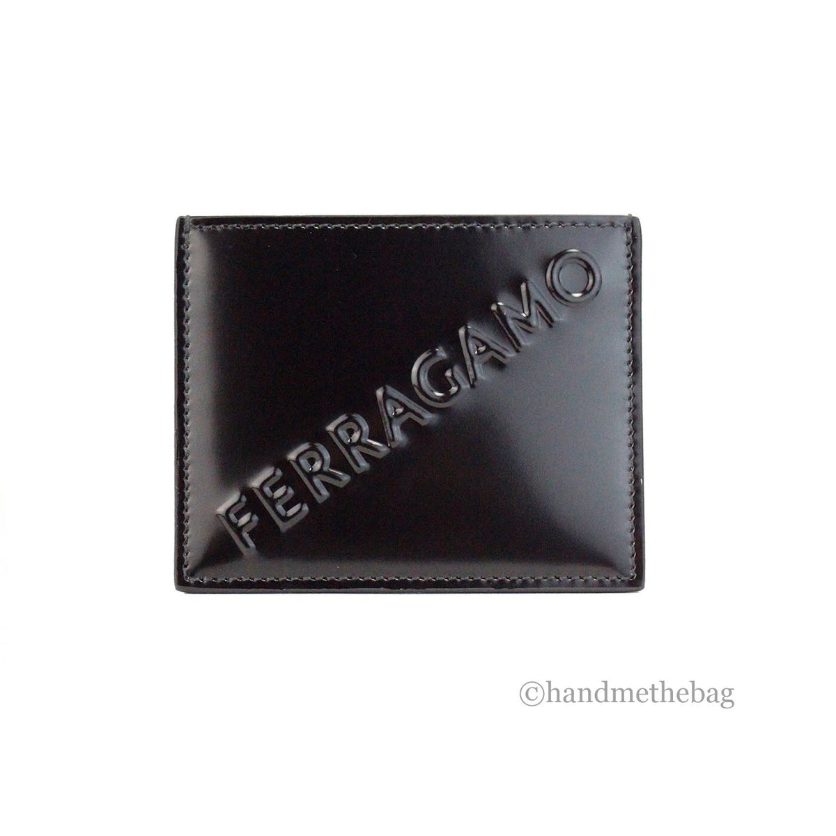 Elevate your style with the Salvatore Ferragamo Slim Black Embossed Patent Leather Card Case Wallet, a testament to exquisite craftsmanship and timeless luxury.