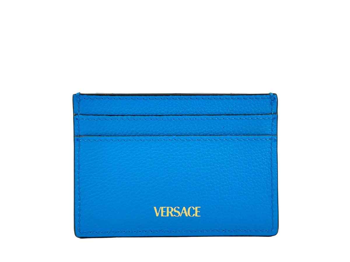 Elevate your style with the Versace Mini Medusa Blue Grainy Leather Slim Card Case Wallet, a symbol of luxury and sophistication, meticulously crafted for the discerning individual.