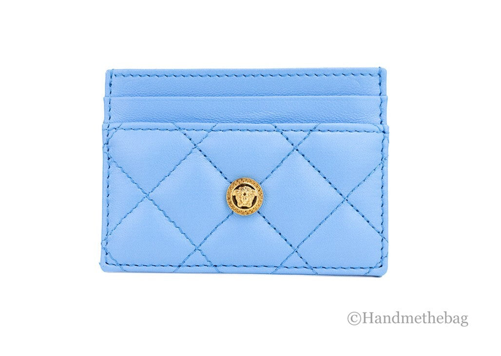 Elevate your elegance with the Versace Mini Medusa DV Blue Quilted Card Case, a luxurious blend of exquisite craftsmanship and timeless sophistication, perfect for discerning individuals.
