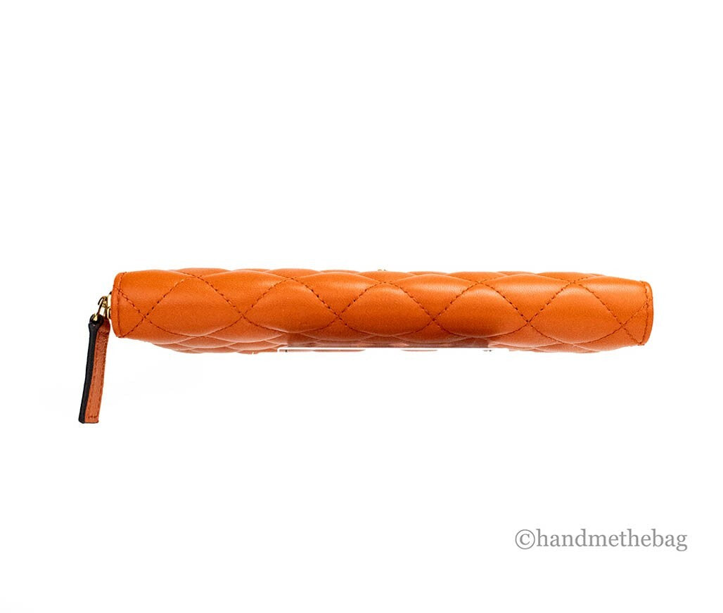 Indulge in the Versace Large Dark Orange Quilted Smooth Leather Continental Clutch, a masterpiece of luxury and craftsmanship, perfect for elevating any ensemble.