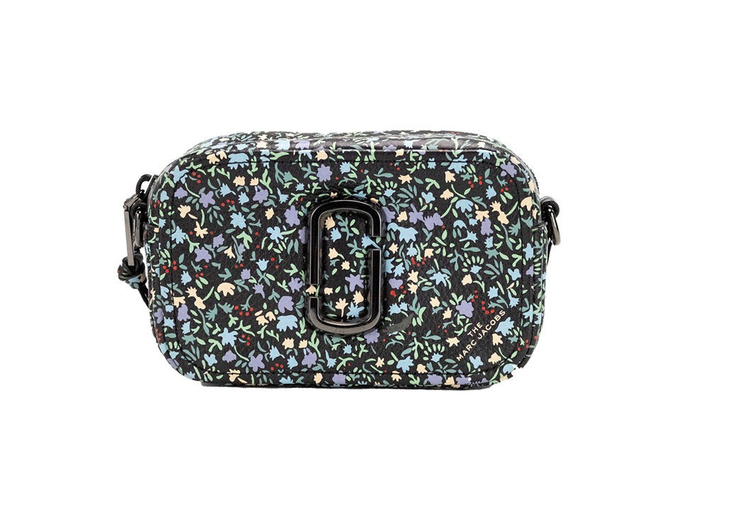 Indulge in the exquisite allure of Marc Jacobs The Mini Floral Snapshot Printed Leather Crossbody Bag, a perfect blend of artistry and elegance for the discerning individual.