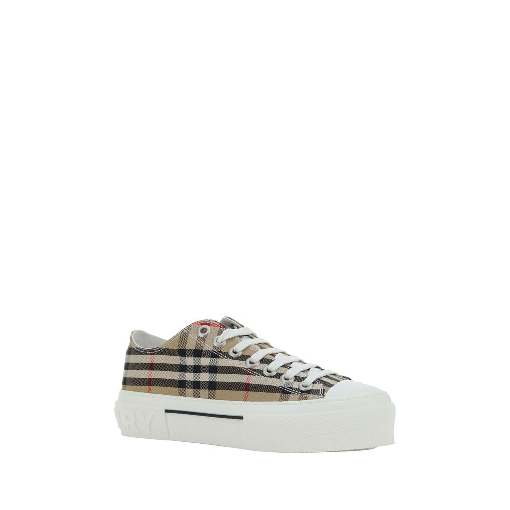 Indulge in the Burberry Brown Synthetic Low Top Sneakers, where iconic design meets exquisite craftsmanship, elevating your urban elegance with every step.