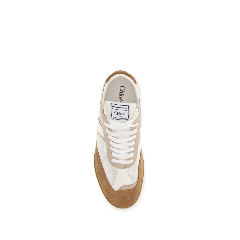 Experience the elegance of Chloé Brown Rubber Athletic Sneakers, crafted from luxurious materials, merging comfort and sophistication for the discerning individual.