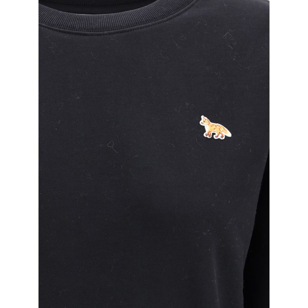 Indulge in the Maison Kitsuné Black Cotton Sweatshirt, crafted from organic cotton fleece, blending effortless luxury with timeless elegance for the discerning individual.