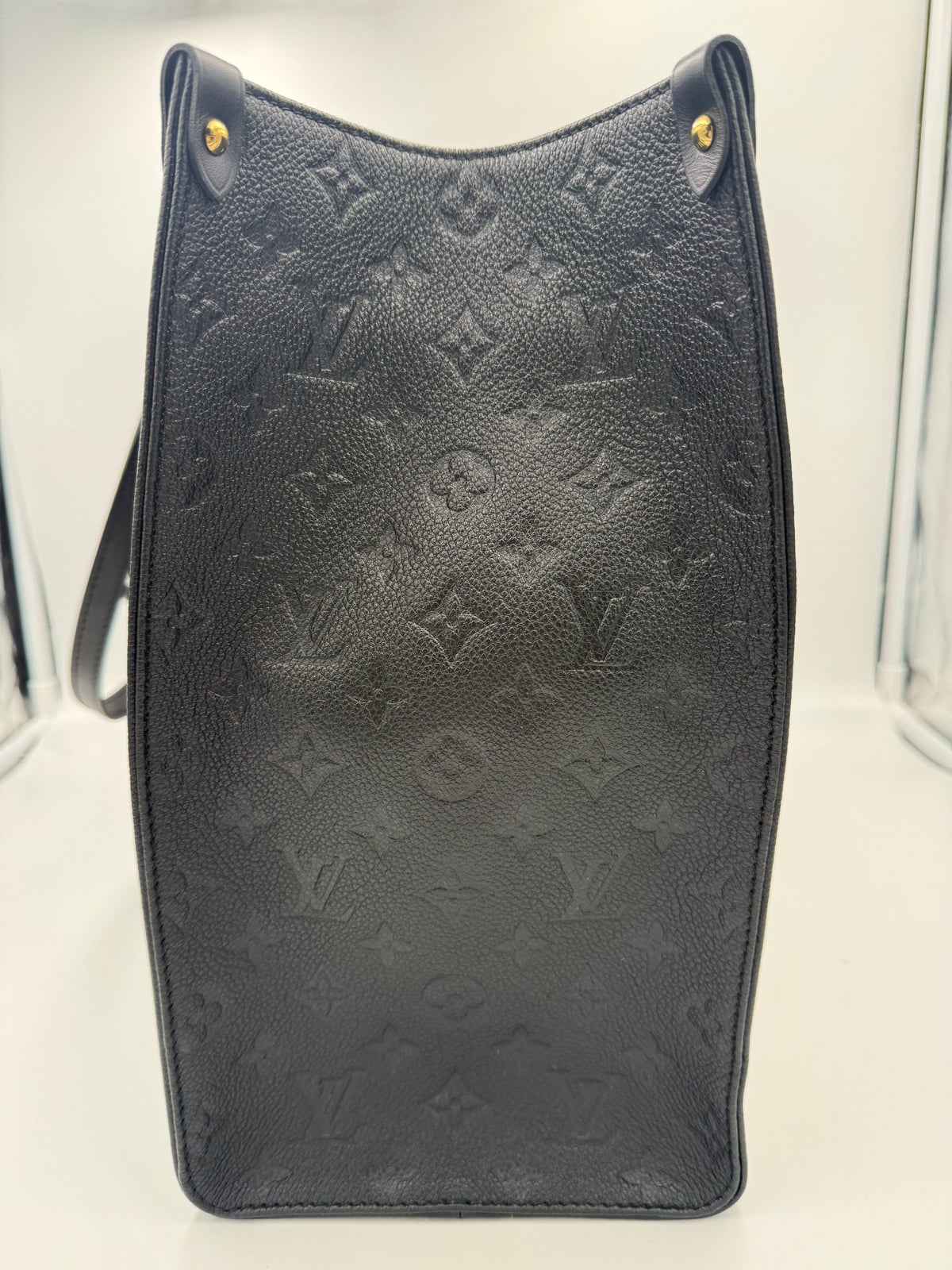 Experience the exquisite allure of the Louis Vuitton ON THE GO Empreinte GM Handbag, a timeless masterpiece that embodies luxury, sophistication, and unparalleled craftsmanship.