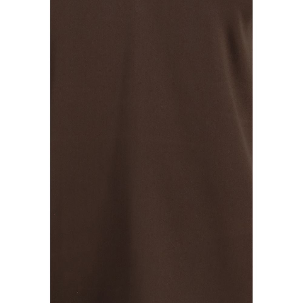 Elevate your wardrobe with the Brunello Cucinelli Brown Silk Sleeveless T-Shirt, a luxurious blend of silk and elastane, embodying timeless elegance for every occasion.