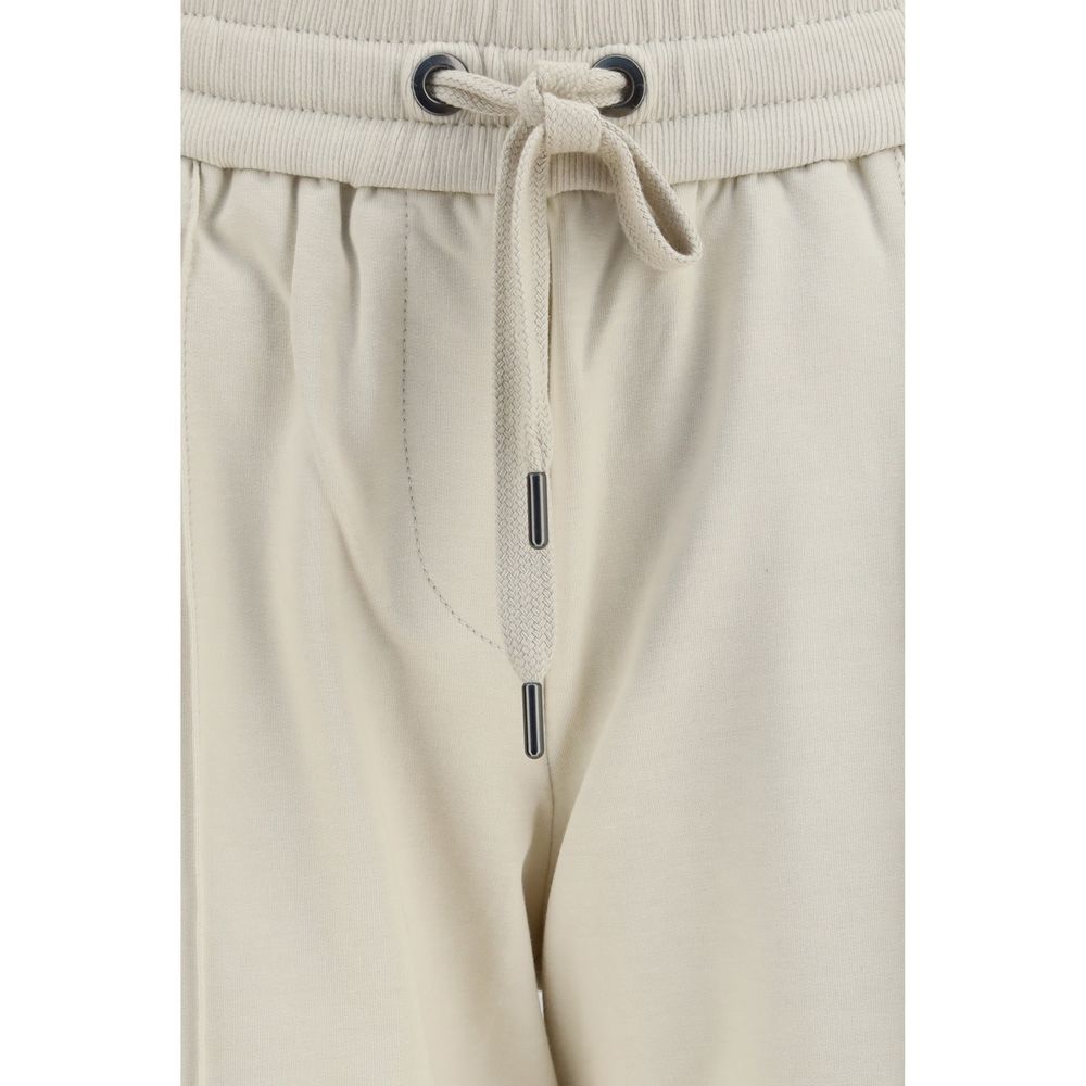 Elevate your athleisure wardrobe with Brunello Cucinelli's Beige Cotton Joggers, crafted from premium cotton for unparalleled comfort and sophistication.