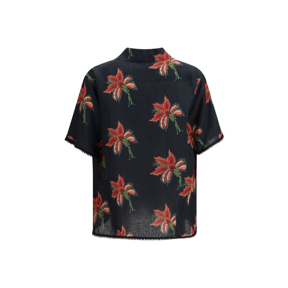 Elevate your wardrobe with the Valentino Garavani Black Linen Pattern Shirt, a masterpiece of 100% linen adorned with exquisite floral prints, embodying effortless luxury for every occasion.