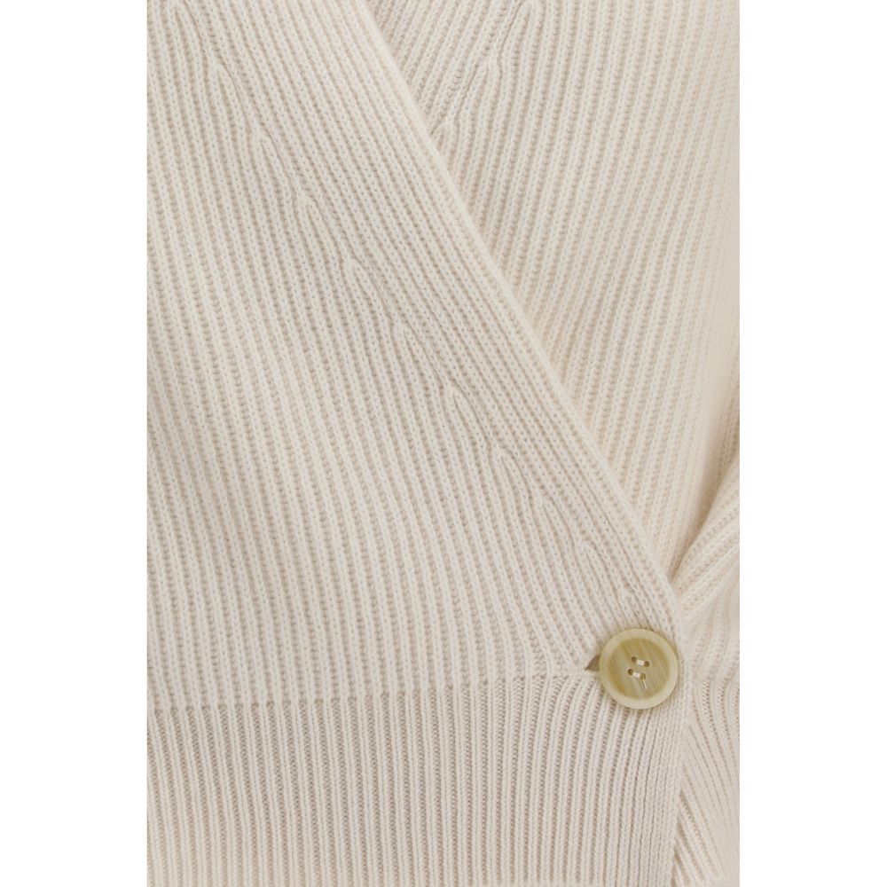Experience the exquisite Brunello Cucinelli Beige Cashmere Cardigan, crafted from 100% cashmere for unparalleled elegance and comfort, perfect for sophisticated occasions.