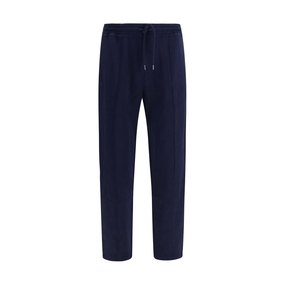 Elevate your wardrobe with Brunello Cucinelli's Blue Cotton Athletic Pants, a luxurious blend of cotton and silk, designed for the discerning individual seeking timeless elegance.