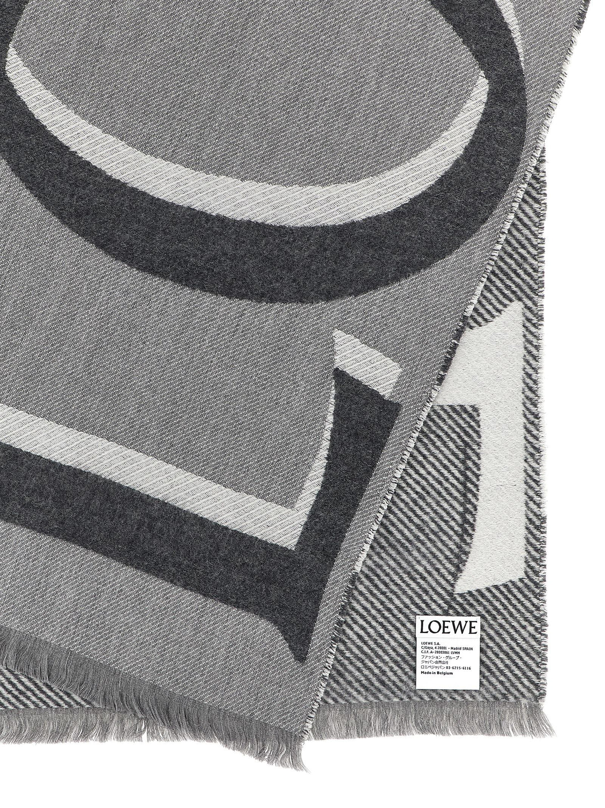 Indulge in the Loewe Multicolor Wool Scarf, a luxurious blend of wool and cashmere, embodying sophistication and warmth for the discerning fashion lover.