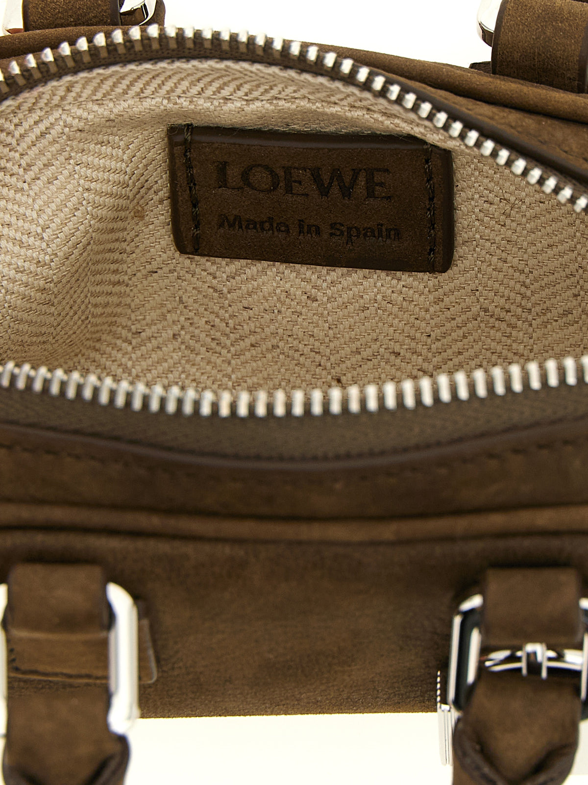 Indulge in the exquisite Loewe Nano ‘Amazona,’ a brown calfskin handbag that embodies timeless elegance and luxurious craftsmanship for the discerning individual.
