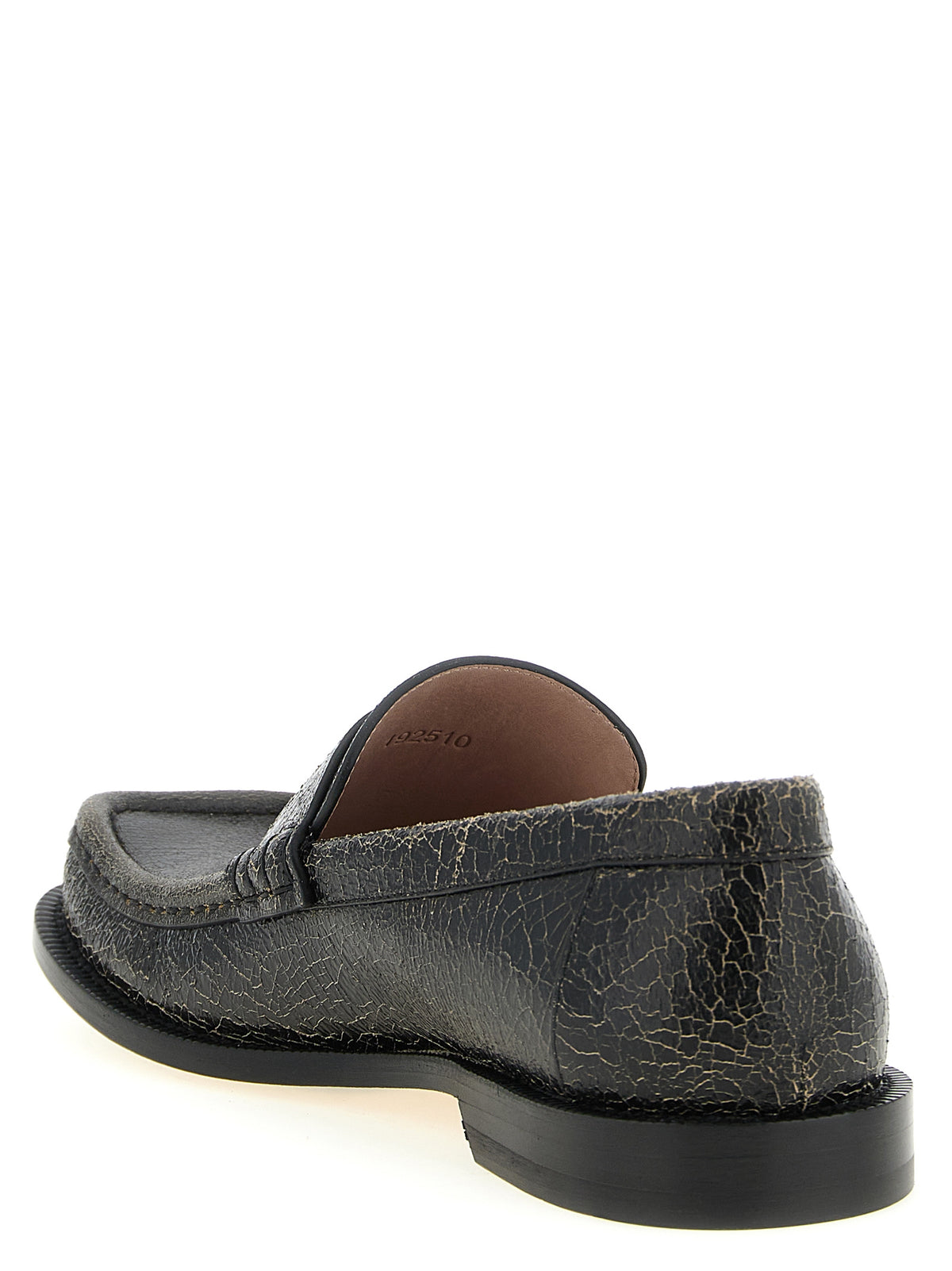 Elevate your style with Loewe's Black Calfskin Slip-On Loafers, where exquisite craftsmanship meets timeless elegance, perfect for the discerning individual.