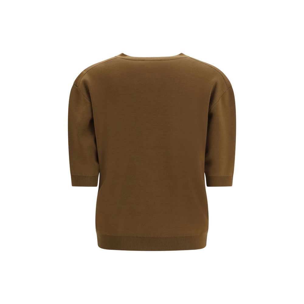 Indulge in the Khaite Brown Wool Oves Aries Cardigan, a masterpiece of 100% fleece wool that embodies refined craftsmanship and effortless elegance for any occasion.
