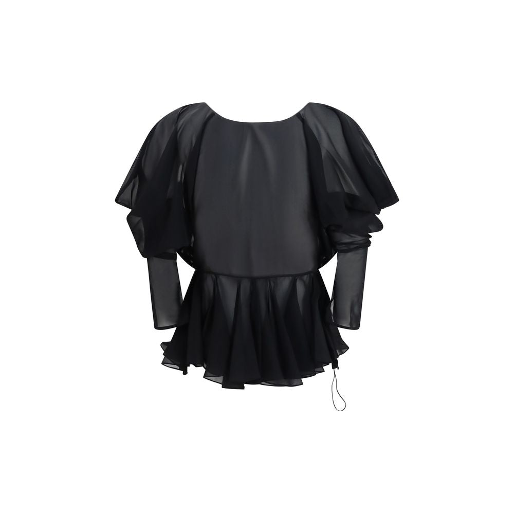 Indulge in the exquisite Khaite Black Silk Blouse, crafted from luxurious silk chiffon, embodying timeless elegance and sophistication for the discerning fashion connoisseur.