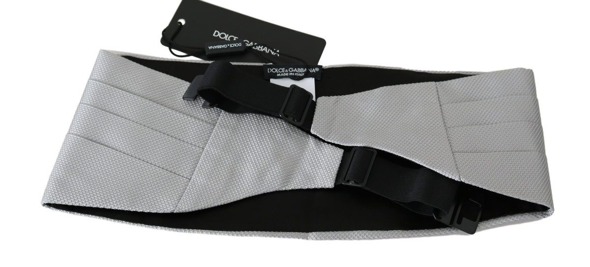Elevate your formal attire with the Dolce & Gabbana Gray Silk Cummerbund, a masterpiece of Italian craftsmanship that embodies luxury and sophistication.