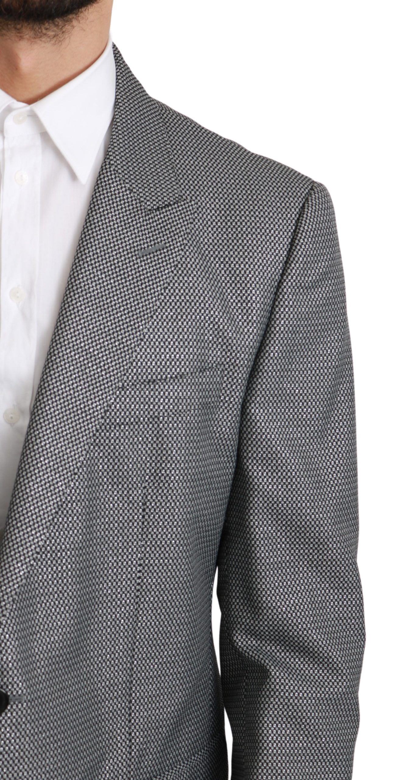 Elevate your style with the Dolce & Gabbana Gray Slim Fit Formal MARTINI Blazer, a luxurious blend of sophistication and Italian craftsmanship, perfect for any occasion.