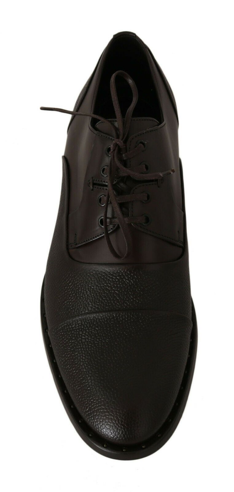 Indulge in the opulent allure of Dolce & Gabbana Brown Leather Laceups Dress Shoes, where exquisite Italian craftsmanship meets timeless elegance for the discerning individual.