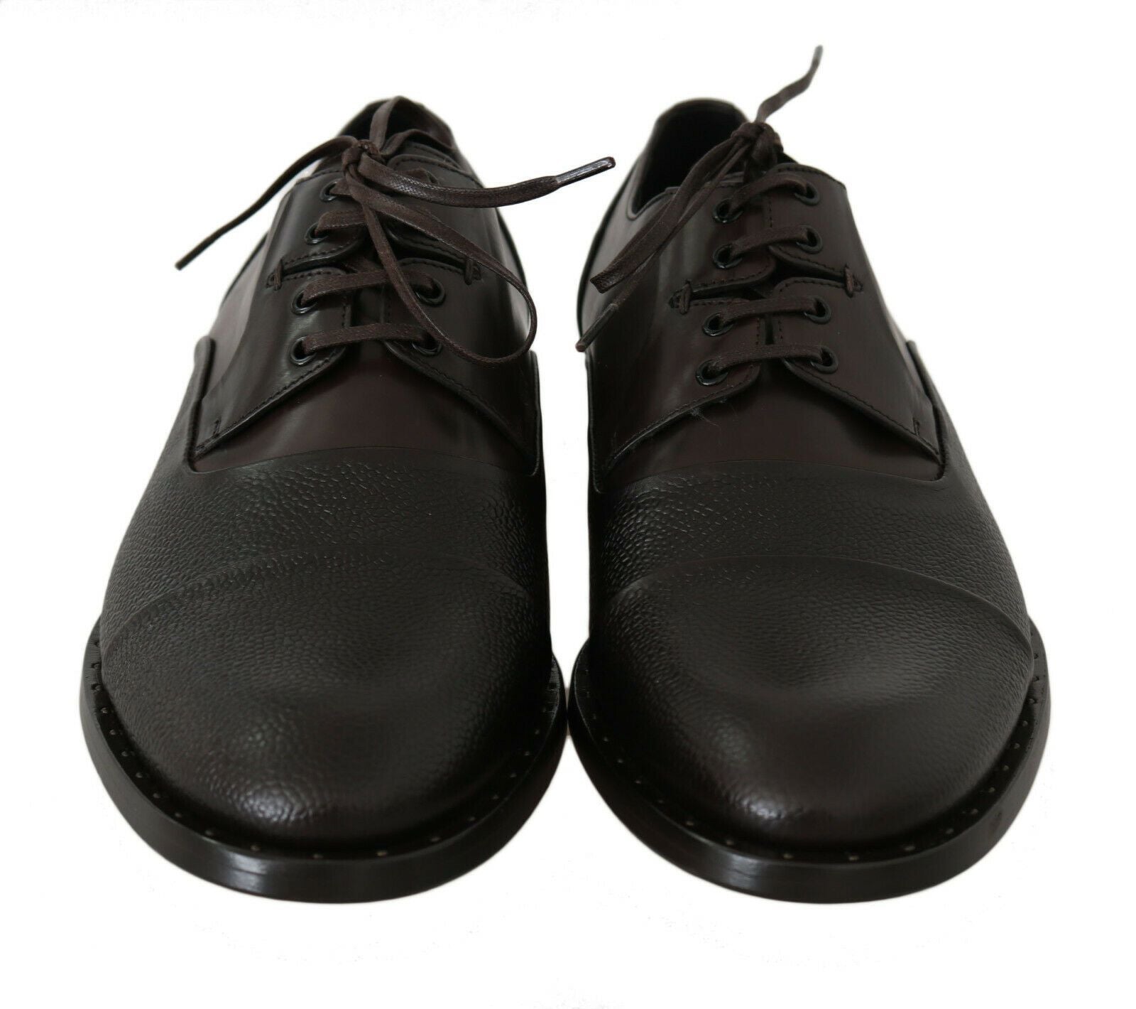 Indulge in the exquisite craftsmanship of Dolce & Gabbana's Brown Leather Laceups, where luxurious leather meets timeless elegance, perfect for the discerning individual.