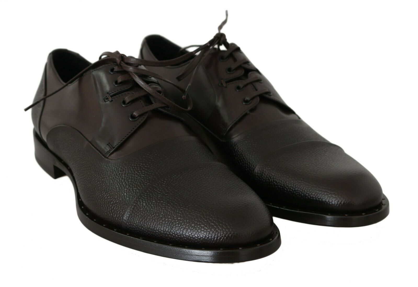 Indulge in the opulence of Dolce & Gabbana Brown Leather Laceups Dress Shoes, where exquisite craftsmanship meets timeless elegance for the discerning individual.