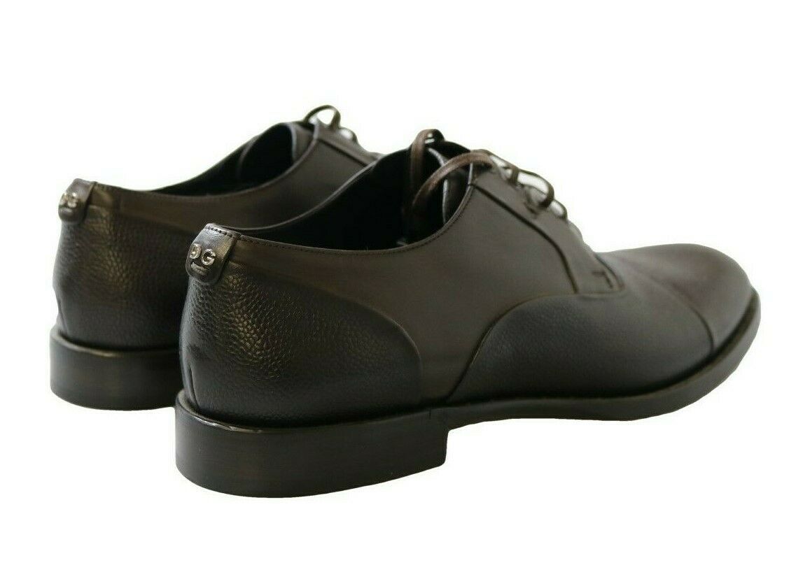 Indulge in the exquisite craftsmanship of Dolce & Gabbana's Brown Leather Laceups Dress Shoes, where luxurious leather meets timeless elegance for the discerning individual.