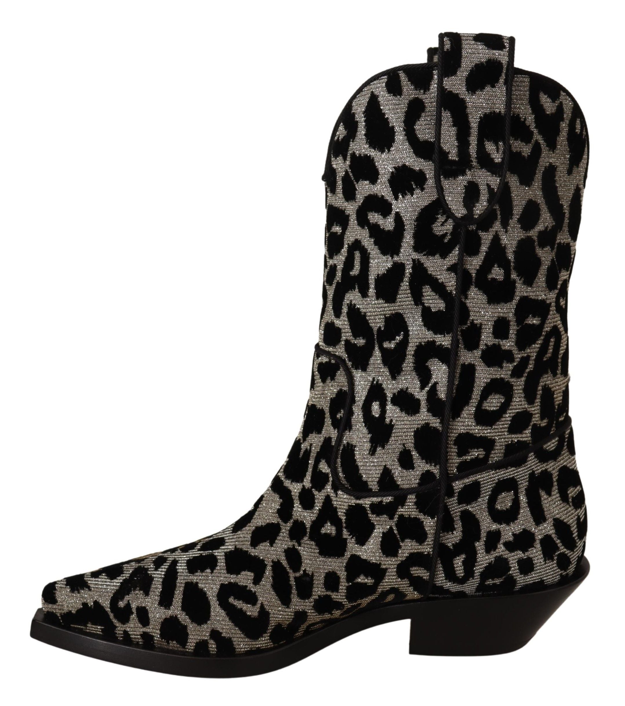 Indulge in the allure of Dolce & Gabbana's Gray Black Leopard Cowboy Boots, where exquisite Italian craftsmanship meets bold luxury, perfect for any sophisticated occasion.