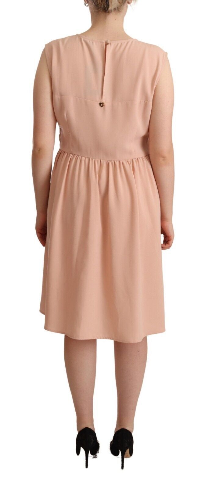 Elevate your wardrobe with Twinset's Beige Polyester Sleeveless Shift Dress, a masterpiece of luxurious craftsmanship that embodies timeless elegance and sophistication.