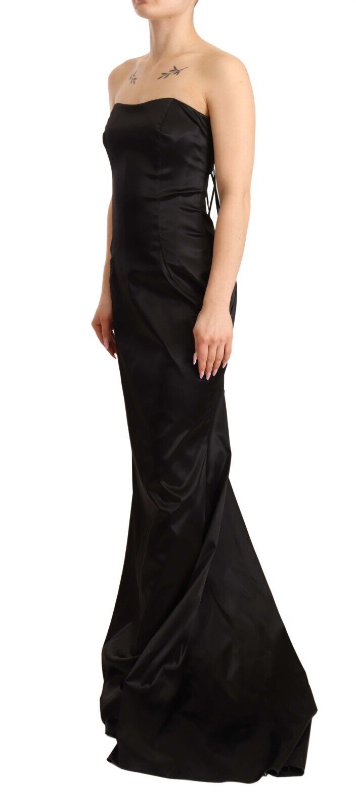 Indulge in the exquisite allure of the Dolce & Gabbana Black Silk Stretch Sheath Mermaid Gown, a timeless masterpiece that embodies luxury, sophistication, and sensuality.