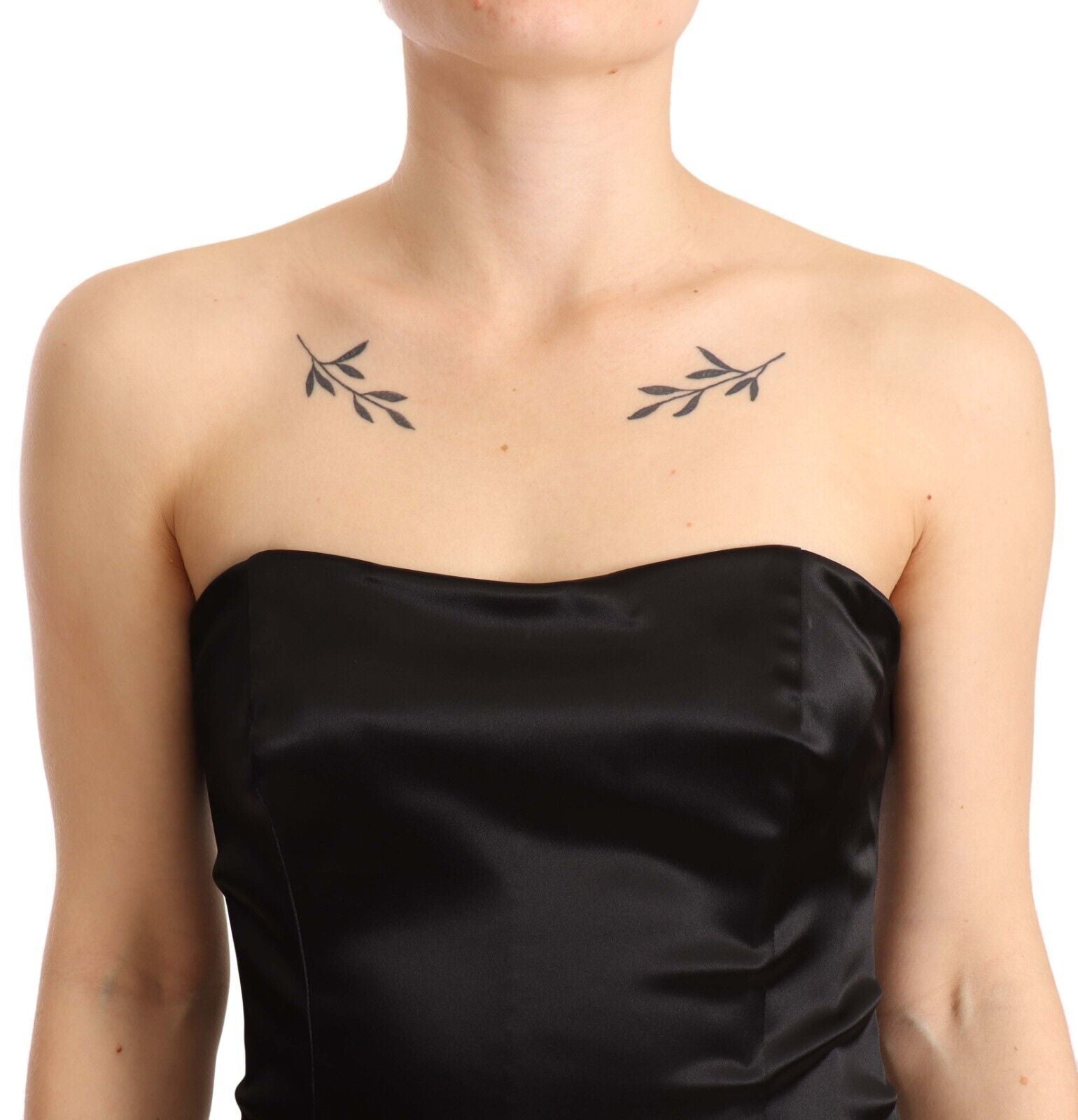 Indulge in the allure of the Dolce & Gabbana Black Silk Stretch Sheath Mermaid Gown, a masterpiece of Italian craftsmanship that embodies timeless elegance and sophistication.