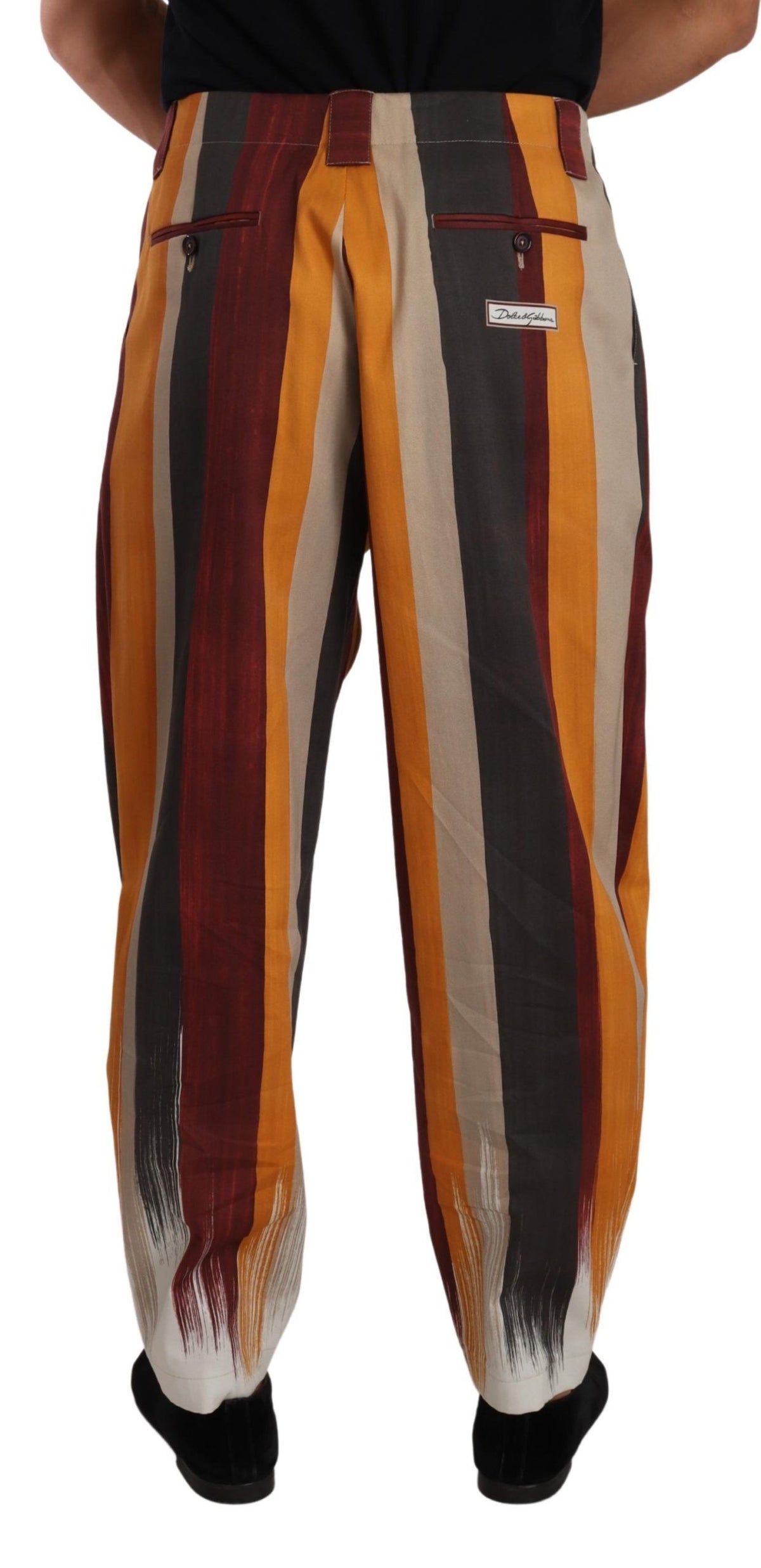 Experience the allure of Dolce & Gabbana's Multicolor Striped Cotton Tapered Trouser Pants, a testament to Italian craftsmanship that embodies luxury and sophistication.