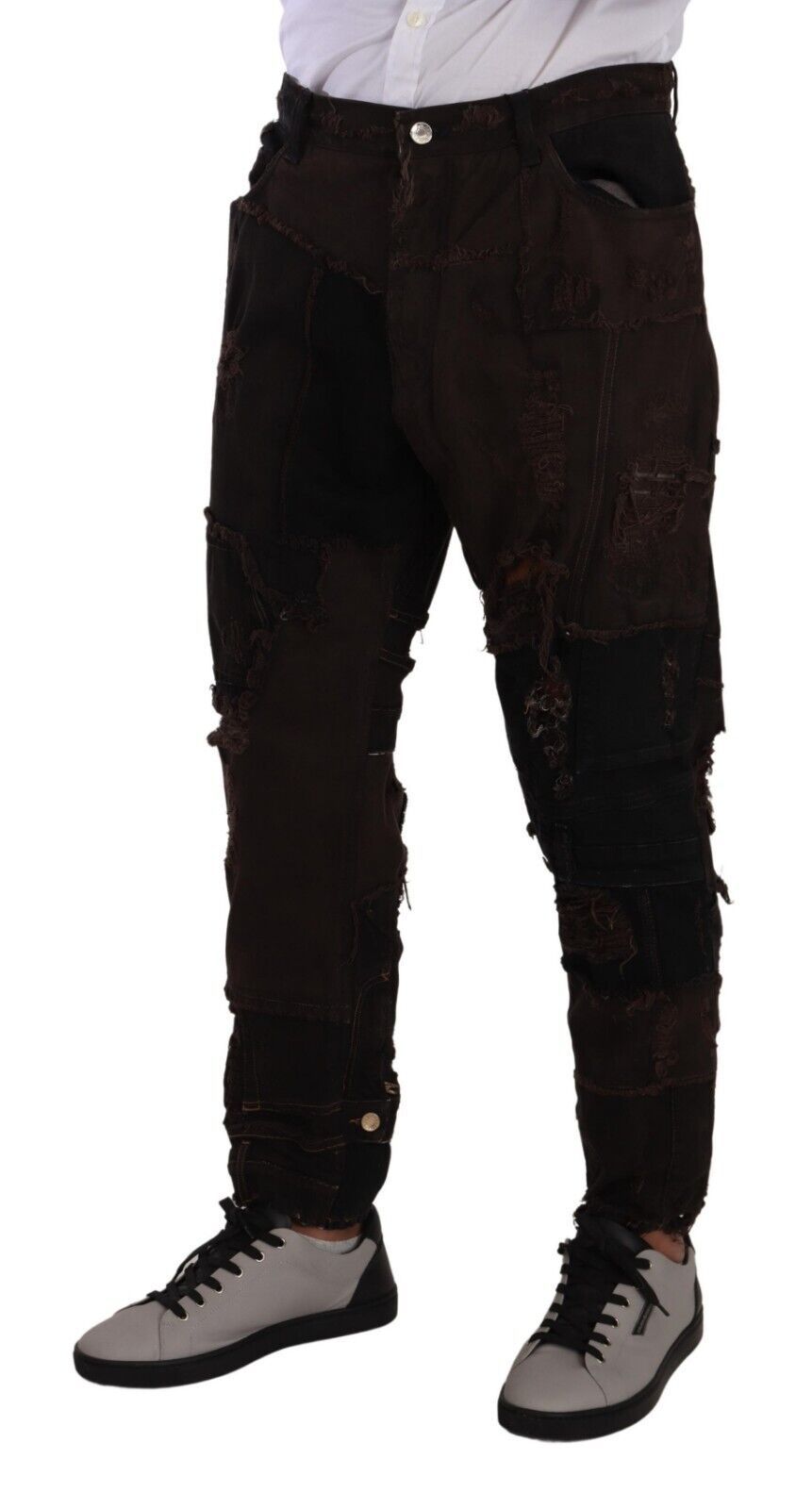Indulge in the artistry of Dolce & Gabbana's Brown Cotton Distressed Denim Jeans, where exquisite craftsmanship meets luxurious comfort for a statement of timeless elegance.