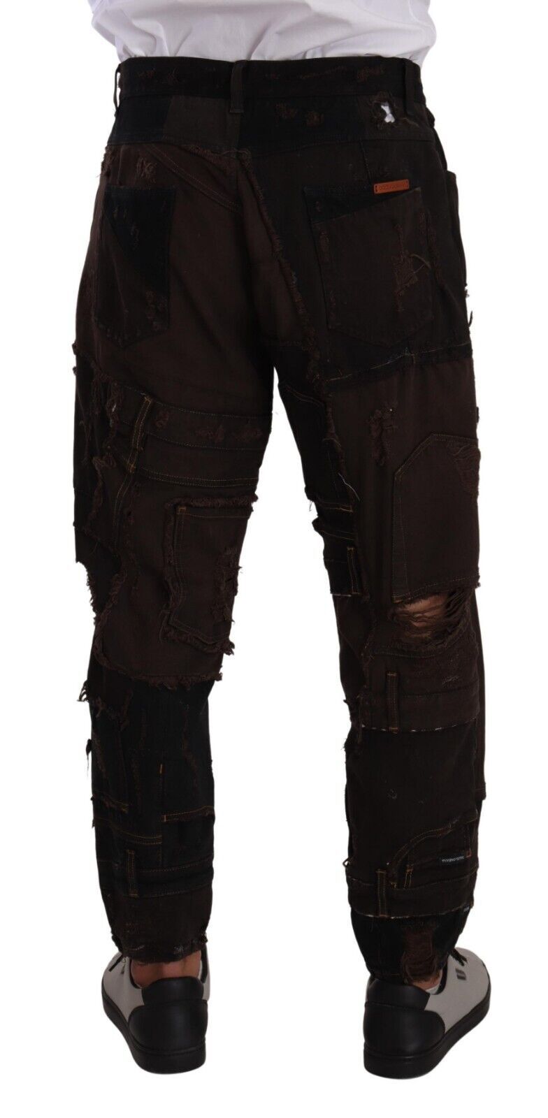 Elevate your wardrobe with Dolce & Gabbana's Brown Cotton Distressed Denim Jeans, where exquisite craftsmanship meets contemporary elegance for a statement of luxury.