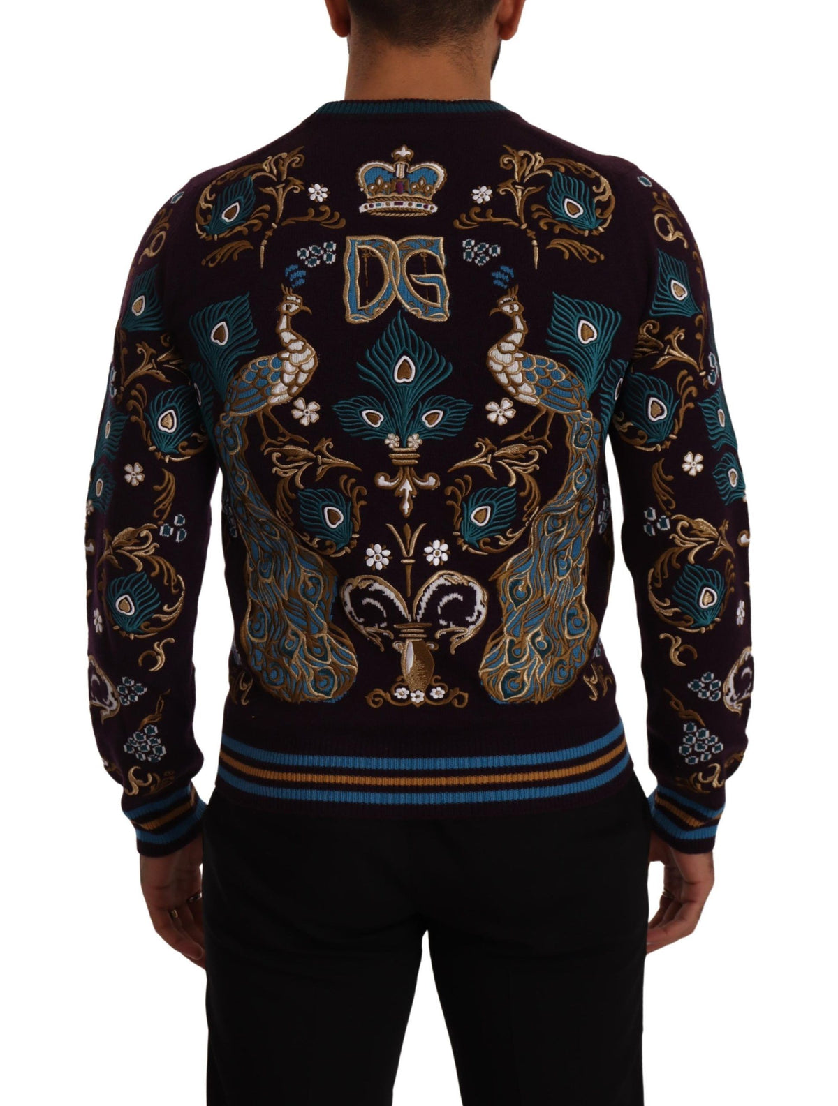 Indulge in the exquisite Dolce & Gabbana Bordeaux Cashmere DG Crown Embroidered Sweater, a timeless symbol of luxury and superior craftsmanship that elevates your style.