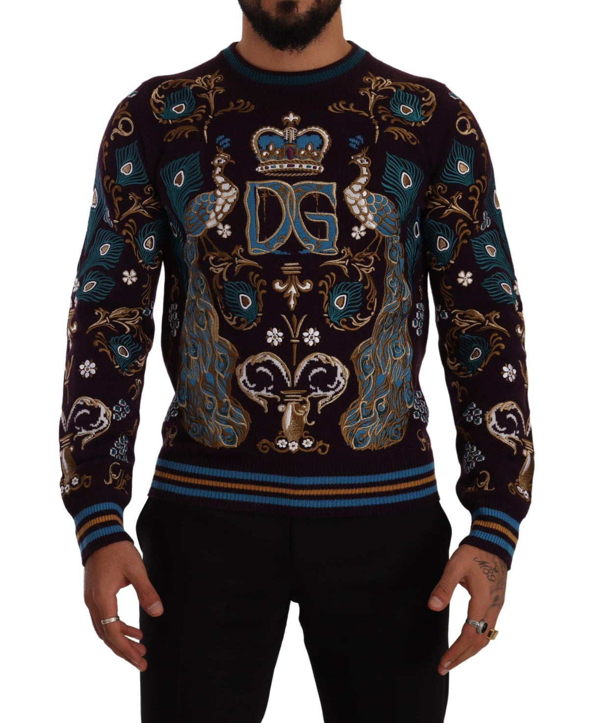 Indulge in the exquisite Dolce & Gabbana Bordeaux Cashmere DG Crown Embroidered Sweater, a timeless piece of luxury that embodies superior craftsmanship and elegance.